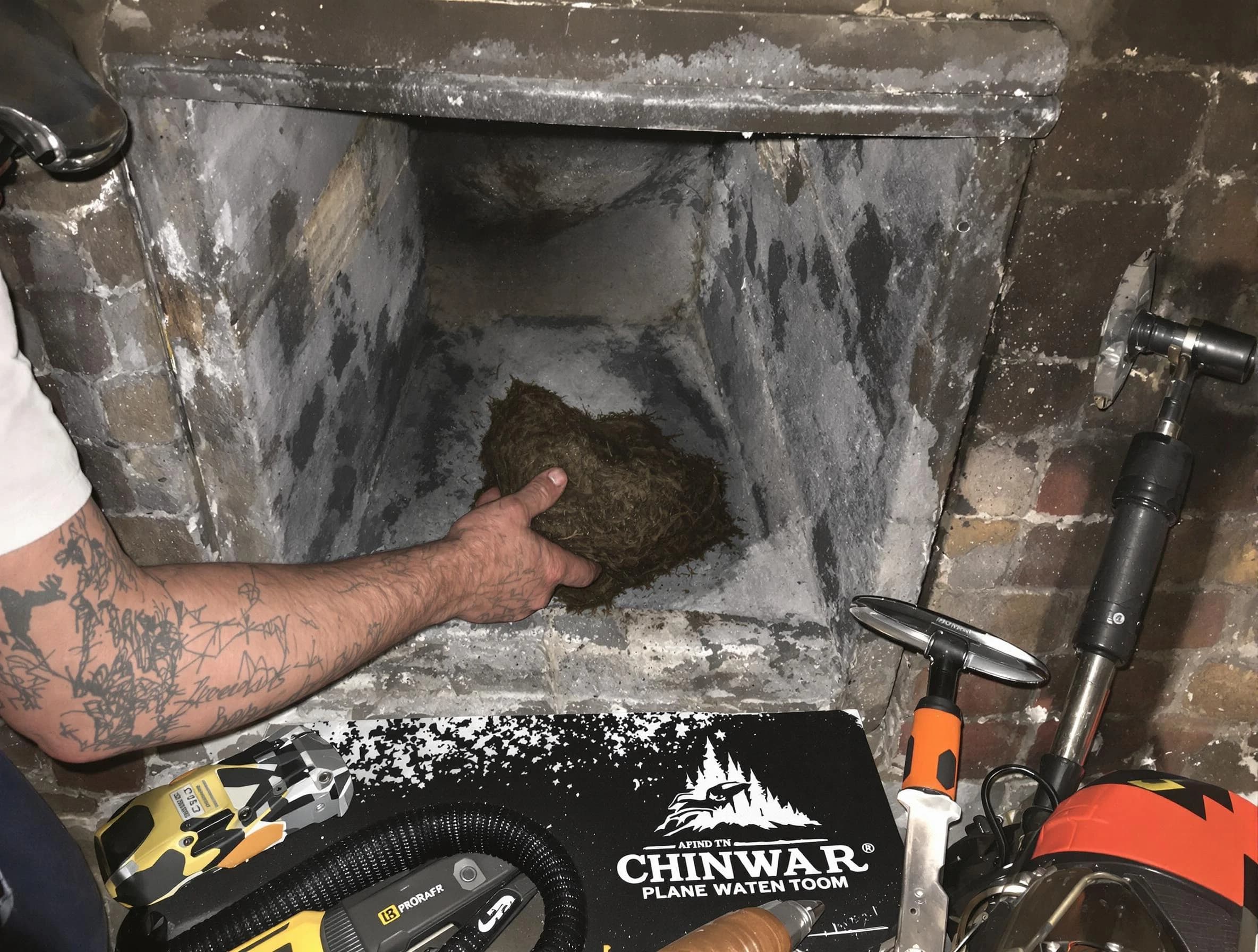 Plainfield Chimney Sweep safely removing debris and screening chimney in Plainfield, NJ